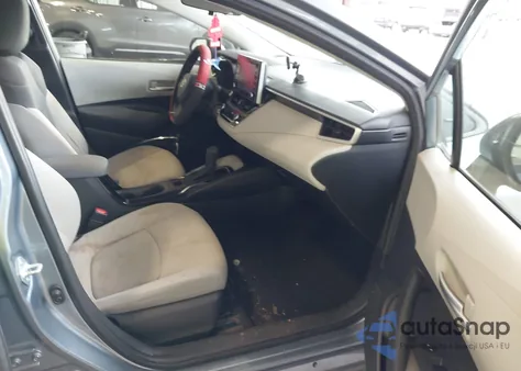 2021 Toyota Corolla Le z USA, uszkodzony, nr VIN JTDEPMAE6MJ125684